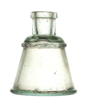 A glass ink bottle.